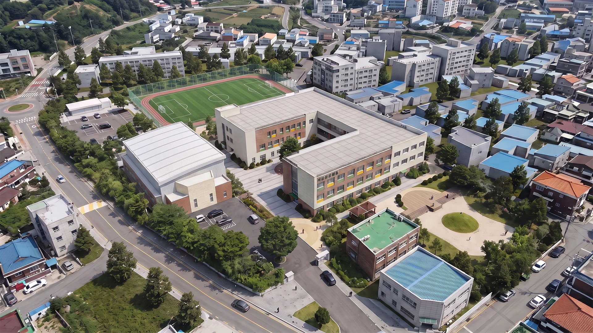 예산초등학교 교사 개축 조감도로 학교 건물과 운동장, 주변 도로 및 인접 건축물의 배치를 표현한 건축 시각화